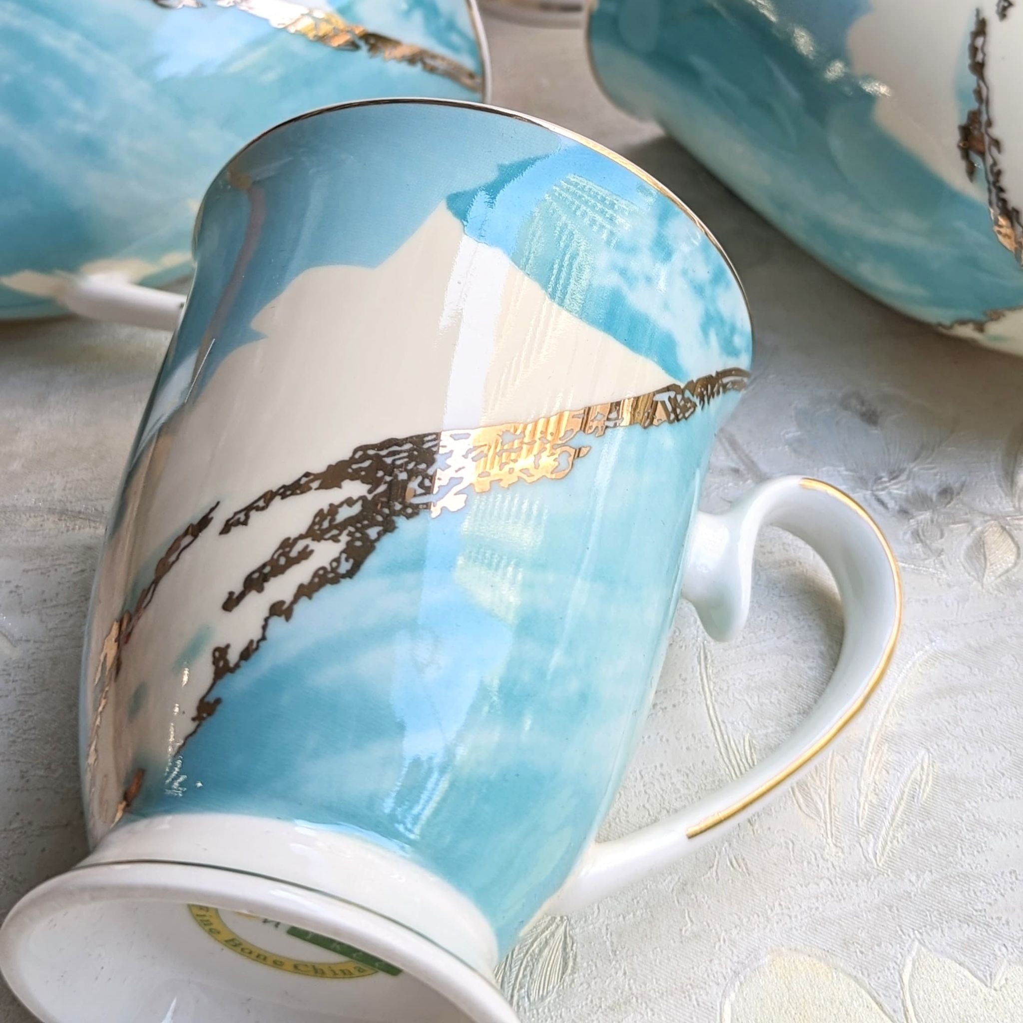 Elegant Aqua Marble Mugs - Set of 4